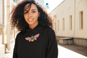 Black hoodie with the Meta Moth design by enfte.